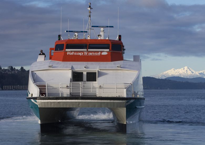 A Kitsap fast ferry from Kingston takes about 40 minutes and docks at Pier 50, near the Colman Dock in Seattle. All three Kitsap Transit fast ferries will begin their summer schedules this Saturday. Ellen M. Banner / The Seattle Times, 2021)