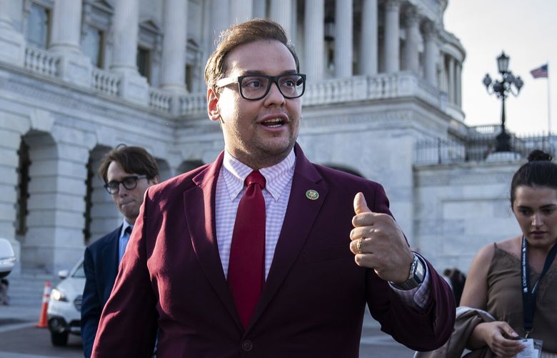 Rep. George Santos (R-N.Y.) speaks to reporters on Capitol Hill in Washington on Wednesday. MUST CREDIT: Washington Post photo by Jabin Botsford.