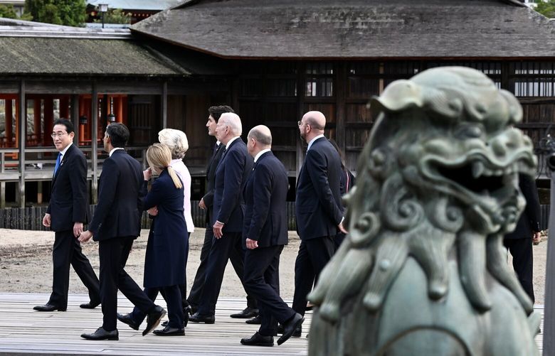 U.S. President Joe Biden and other G7 leaders visit the Itsukushima Shrine on Miyajima Island in Hatsukaichi, Japan on the first day of the 47th G7 Summit, on May 19, 2023. The U.S. finds itself caught between defending President Biden’s climate change agenda and aiding allies intent on increasing their access to fossil fuels. (Kenny Holston/The New York Times) XNYT43 XNYT43