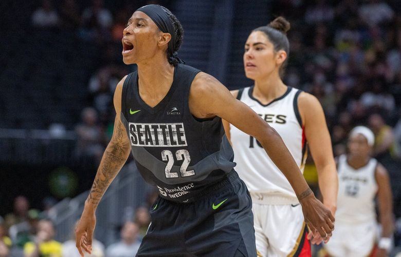 Seattle Storm’s Yvonne Turner with Las Vegas’ Aces Kelsey Plum Saturday afternoon at the Climate Pledge Arena in Seattle, Washington on May 20, 2023. The Storm lost 105-64 in the season opener against the Aces.