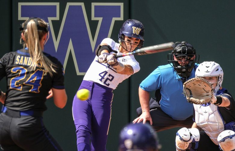 With Madison Huskey on second, Washington’s Jadelyn Allchin rips a RBI double down the right field line in the fourth inning.  Allchin would advance to third on a throwing error. 223983