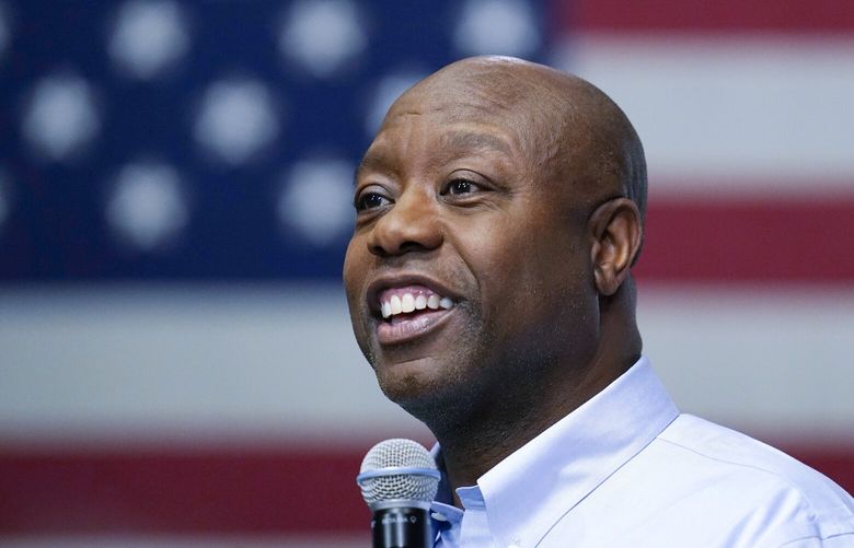 FILE – Sen. Tim Scott, R-S.C., speaks during a town hall, Monday, May 8, 2023, in Manchester, N.H. Scott filed paperwork with the Federal Election Commission declaring his intention to seek his party’s nomination in 2024. (AP Photo/Charles Krupa, File) WX215 WX215