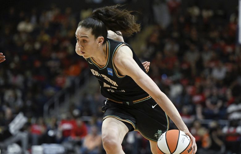 New York Liberty forward Breanna Stewart (30) drives to the basket during the first half of a WNBA basketball game against the Washington Mystics, Friday, May 19, 2023, in Washington. (AP Photo/Terrance Williams) NYOTK NYOTK