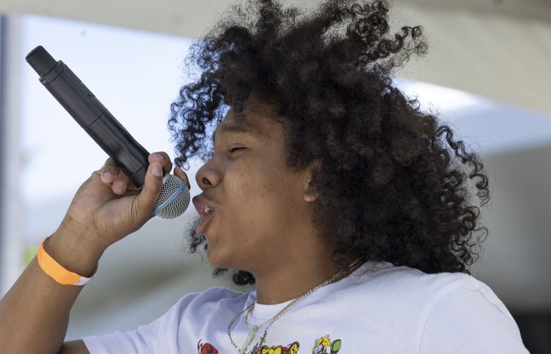Isaiah “Zaay” Woo leads his band, King ZAAY, at the beginning of their set as part of KEXP “Behind the Beat†outdoor concert at Seattle Center Saturday, May 13, 2023.
There were live performances and DJs in the Northwest Courtyard outside KEXP’s Gathering Space, KEXP’s first outdoor concert of the season. In August, their beloved “Concerts at the Mural†series returns. This is the first summer all of Seattle Center’s signature festivals/concerts, joining several newer events and Climate Pledge Arena, which has become one of the top-selling concert arenas in the world.
Seattle Center reemerges as city’s premier concert destination this summer
223814