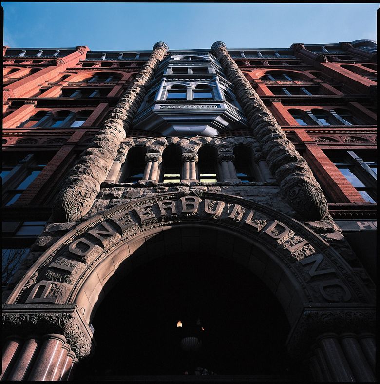 THE PIONEER BUILDING: The facade combines stone, brick, terra cotta, marble and sheet metal, with Romanesque ornament drawing attention to the arched entrance. (Harley Soltes / The Seattle Times, 1999)