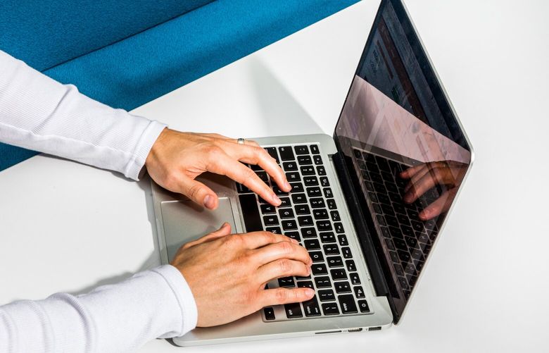 Working remotely on a laptop in Jan. 9, 2019. (Christie Hemm Klok/The New York Times)