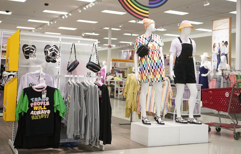 Pride month merchandise is displayed at the front of a Target store in Hackensack, N.J., Wednesday, May 24, 2023. Target is removing certain items from its stores and making other changes to its LGBTQ+ merchandise nationwide ahead of Pride month, after an intense backlash from some customers including violent confrontations with its workers. (AP Photo/Seth Wenig) 