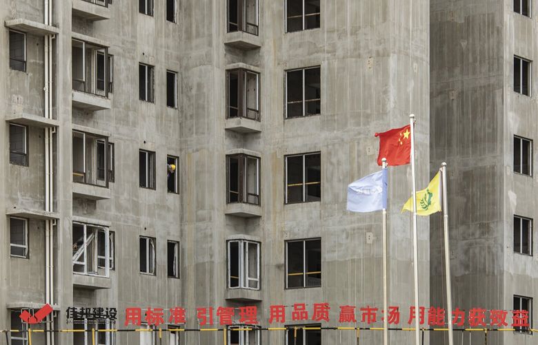 Empty apartments in an unfinished residential tower in Nanchang, China on Monday, May 22, 2023. Nanchang’s skyscrapers represented urban transformation, but the city added apartments faster than its population grew. (Qilai Shen/The New York Times)