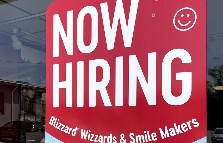 A hiring sign is displayed at a fast food restaurant in Northbrook, Ill., Monday, May 22, 2023. On Thursday, the Labor Department reports on the number of people who applied for unemployment benefits last week. (AP Photo/Nam Y. Huh) NYPM401 NYPM401