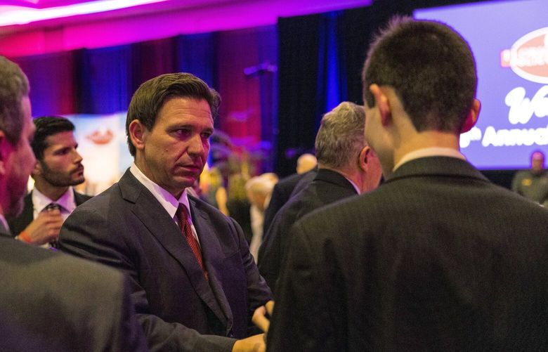 Florida Gov. Ron DeSantis at an annual dinner gala of the Florida Family Policy Council, in Orlando, Fla., May 20, 2023. DeSantis has yet to sign Florida’s $117 billion budget, over which he retains a line-item veto, which gives him a sharp point of leverage with lobbyists and legislators from whom is seeking campaign donations and endorsements. (Saul Martinez/The New York Times) XNYT0517 XNYT0517