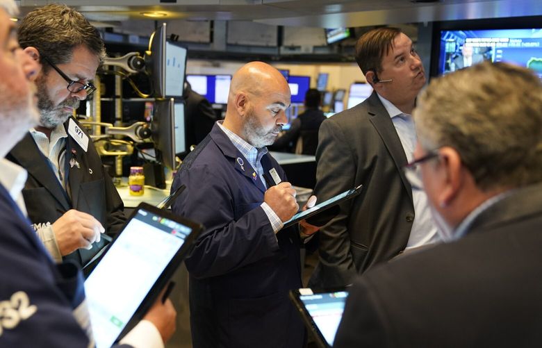 Traders work on the floor at the New York Stock Exchange in New York, Thursday, May 25, 2023. (AP Photo/Seth Wenig) 