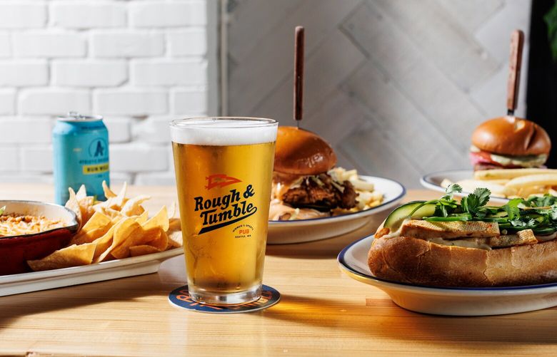 The menu at Rough and Tumble features pub-style classics with elevated ingredients, like a fried chicken sandwich with chipotle aioli and a tangy coleslaw.