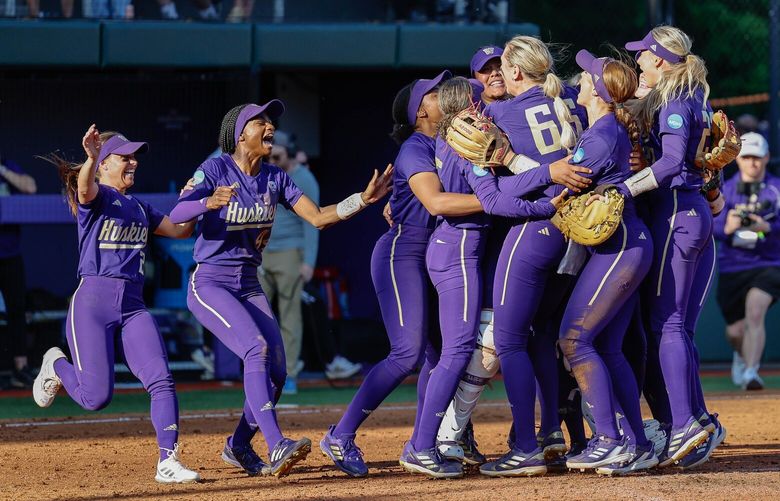 Behind pitcher Ruby Meylan, who came in to finish the game in the seventh, Washington wins its way into the College World Series. 224031