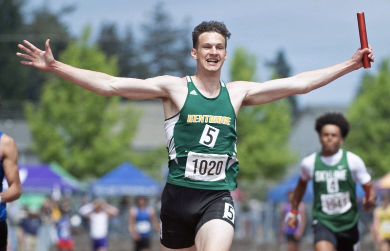Kentwood’s Alex Conner celebrates as he brings home the state title for his team in the 4A boys 4×100 relay during the final day of the WIAA state track and field championships at Mount Tahoma High School in Tacoma, Washington, on Friday, May 26, 2023.