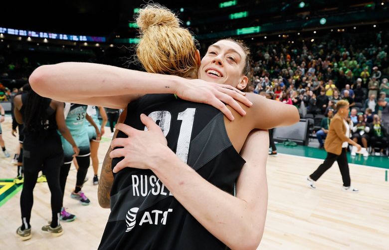 New York Liberty forward Breanna Stewart hugs Seattle Storm center Mercedes Russell after the end of the game.  224046