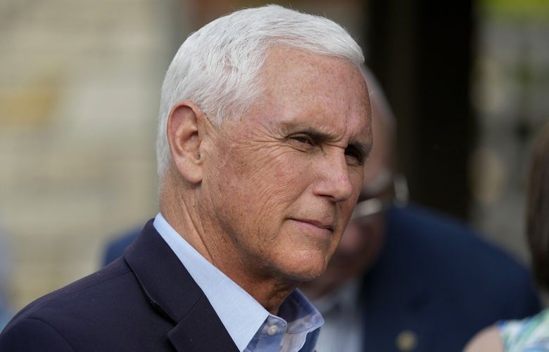 Former Vice President Mike Pence talks with local residents during a meet and greet, Tuesday, May 23, 2023, in Des Moines, Iowa. (AP Photo/Charlie Neibergall) IACN102 IACN102