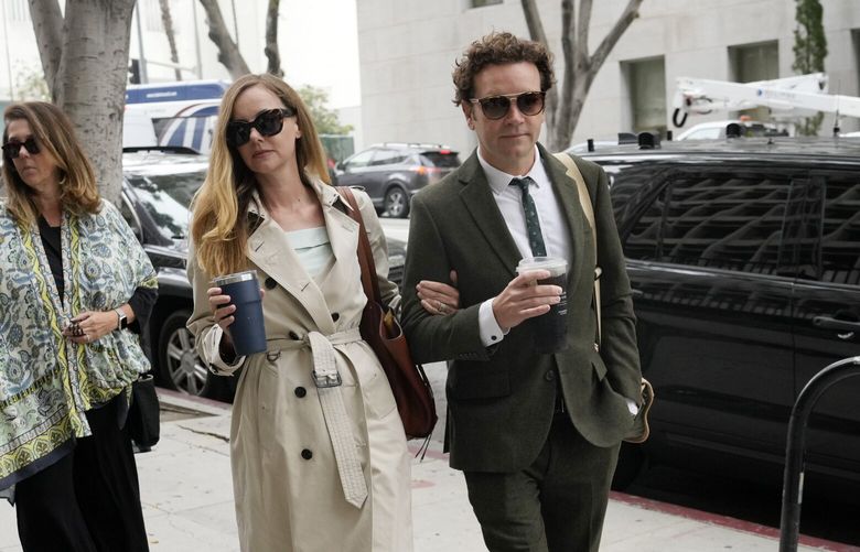 Danny Masterson and his wife Bijou Phillips arrive for closing arguments in his second trial, Tuesday, May 16, 2023, in Los Angeles. Masterson is charged with raping three women at his Los Angeles home between 2001 and 2003. (AP Photo/Chris Pizzello) CACP110 CACP110
