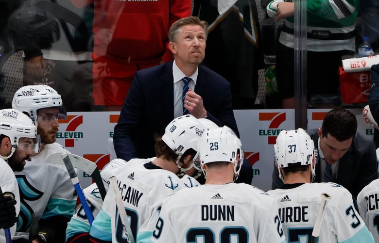 Head coach Dave Hakstol looks up at the score board as the final minutes of the third period wind down in the Kraken’s 2-1 loss in game 7 to the Dallas Stars.  223853