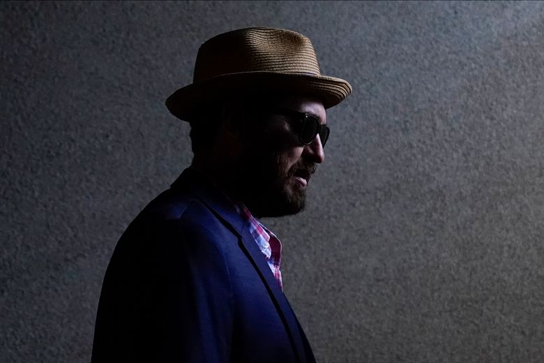 AP PHOTOS: Kentucky Derby hat styles: Bigger is often better