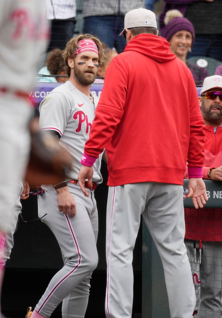 Harper tossed after charging Colorado's dugout