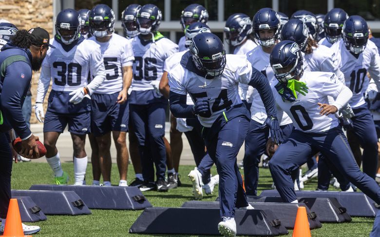 Pete Carroll provides update on Tariq Woolen following 'weird occurrence'  injury - Field Gulls