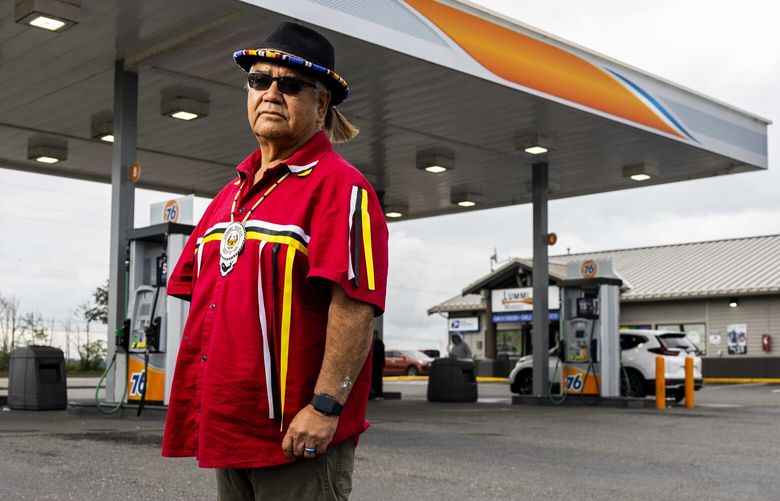 Henry Cagey, a member of the Lummi Nation Business Council, is photographed next to the Lummi Bay Market near the Silver Reef Casino Resort on the Lummi Reservation on May 22, 2023.