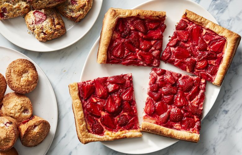 Strawberry desserts in New York, on May 18, 2023. What better way to celebrate strawberries than by baking them into berry-laden desserts? Food Stylist: Simon Andrews. (Christopher Testani/The New York Time/The New York Times) XNYT0519