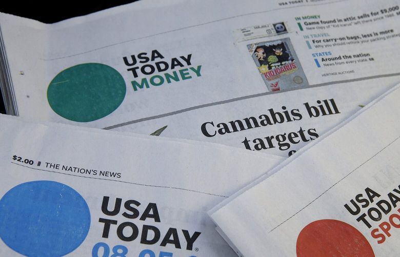 FILE – Sections of a USA Today newspaper are displayed Aug. 5, 2019, in Norwood, Mass. Journalists across the U.S. will walk off their jobs next week at publications owned by Gannett, the largest newspaper chain in the U.S. The mostly one-day strike, which will start Monday, June 5, 2023, aims to protest the company’s leadership and cost-cutting measures imposed since its 2019 merger with GateHouse Media. (AP Photo/Steven Senne, File)