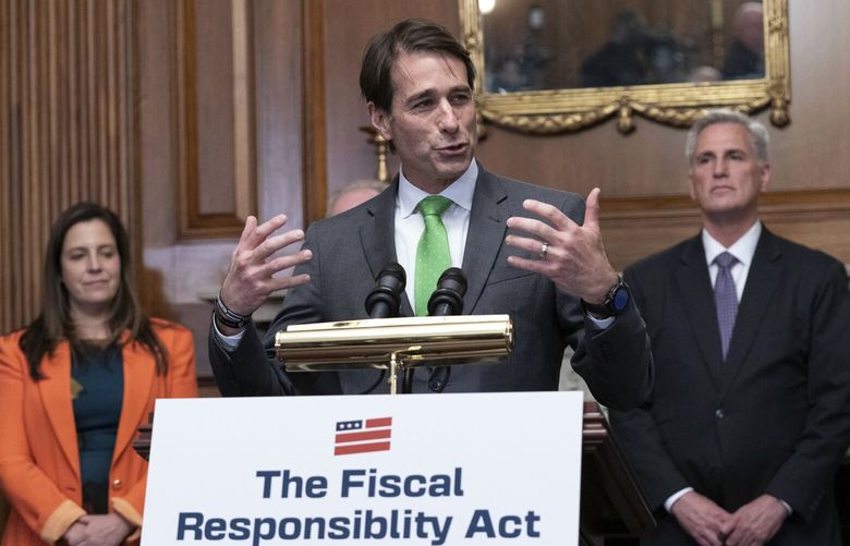 Rep. Garret Graves, R-La., flanked by House Republican Conference Chair Elise Stefanik, R-N.Y., and Speaker of the House Kevin McCarthy of Calif., speaks at a news conference after the House passed the debt ceiling bill at the Capitol in Washington, Wednesday, May 31, 2023. The bill now goes to the Senate. (AP Photo/Jose Luis Magana) DCJL127 DCJL127