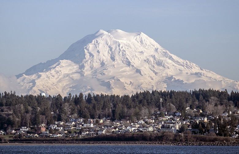 Mt. Rainier as seen from the Puget Sound off the coast of Steilacoom, Washington on February 24, 2023.