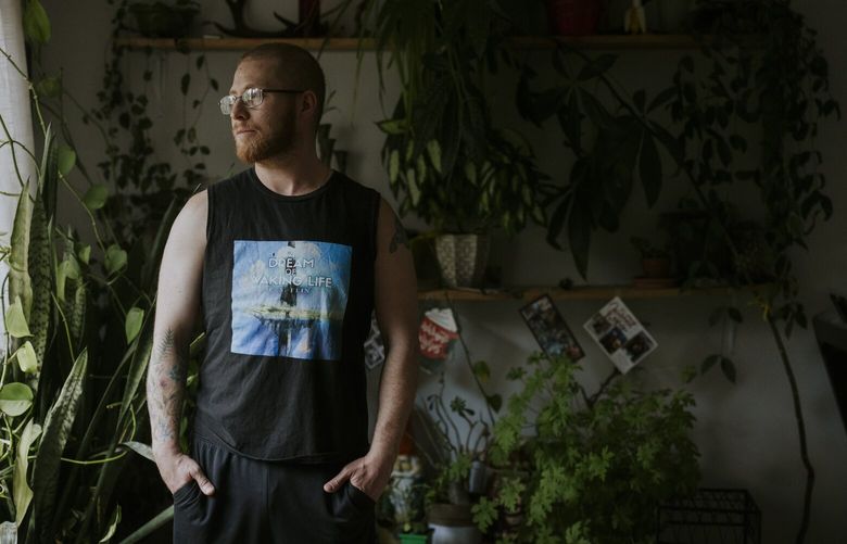 Eric Fein at his home in Bloomingdale, Ill. Fein lost many of his writing jobs to ChatGPT and plans to attend a technical school to study heating, ventilation and air conditioning systems. (Photo for The Washington Post by Taylor Glascock)