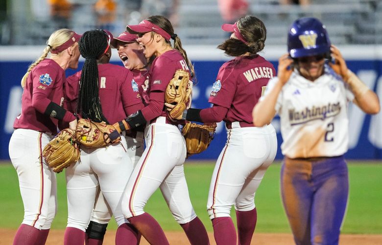 Florida State celebrates getting Megan Vandergrift in the double play ot end the game. 224084