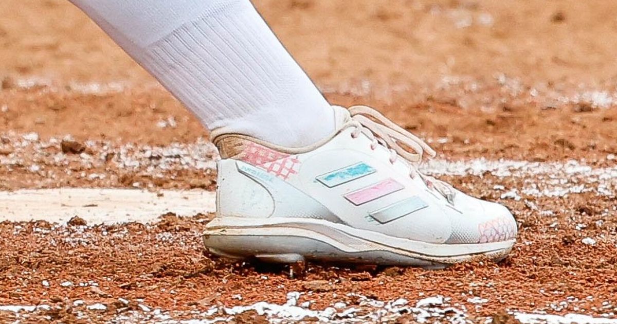 Husky softball players wear cleats decorated by Seattle Children’s