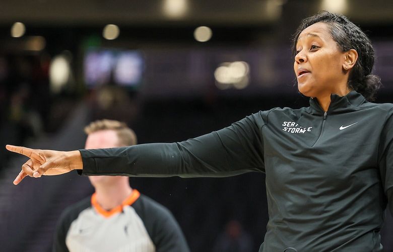 Seattle Storm’s head coach Noelle Quinn reacts to the action of the court against the Phoenix Mercury Monday evening at Climate Pledge Arena in Seattle, Washington on May 8, 2023. The Storm lead 43-36 at the half.