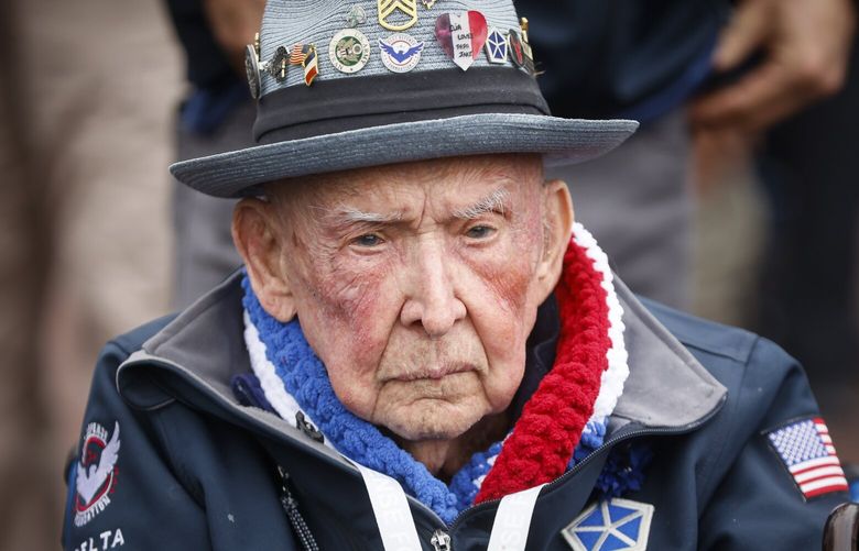 World War II veterans Jake Larson attends a ceremony to mark the 79th anniversary of the assault that led to the liberation of France and Western Europe from Nazi control, at the American Cemetery in Colleville-sur-Mer, Normandy, France, Tuesday, June 6, 2023. The American Cemetery is home to the graves of 9,386 United States soldiers. Most of them lost their lives in the D-Day landings and ensuing operations. (AP Photo/Thomas Padilla) PAR153 PAR153