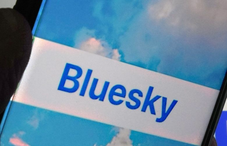 The app for Bluesky is shown on a mobile phone on June 2, 2023. (AP Photo/Richard Drew)