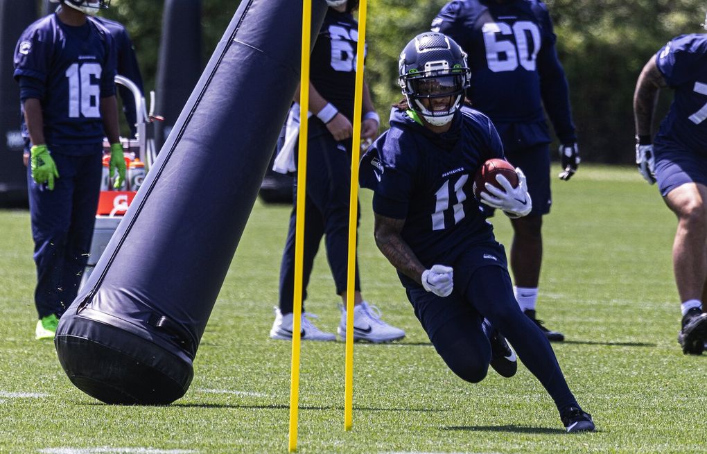 As Seahawks open training camp, rookie Devon Witherspoon unsigned and  absent 