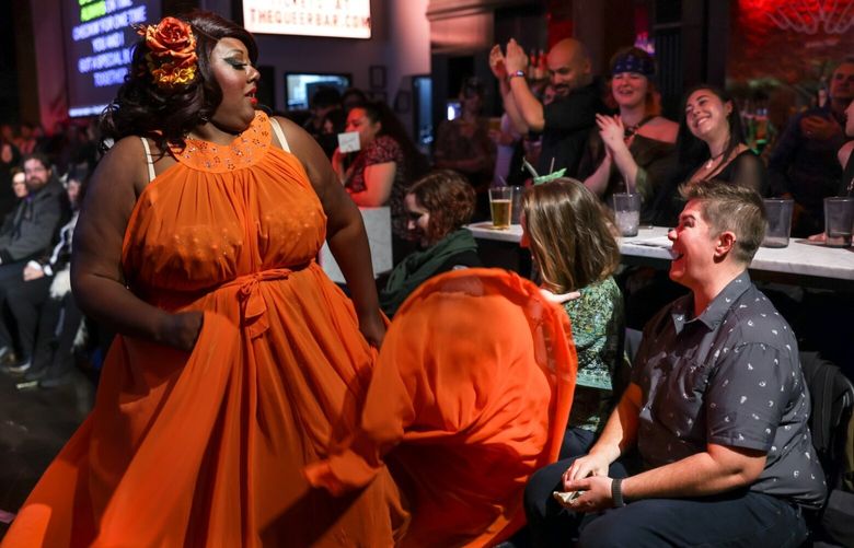 Burlesque entertainer Mx. Pucks A’ Plenty is a 2023 Seattle Pride grand marshal. They are the founder and coproducer of What the Funk?! Festival, an all BIPOC burlesque festival.