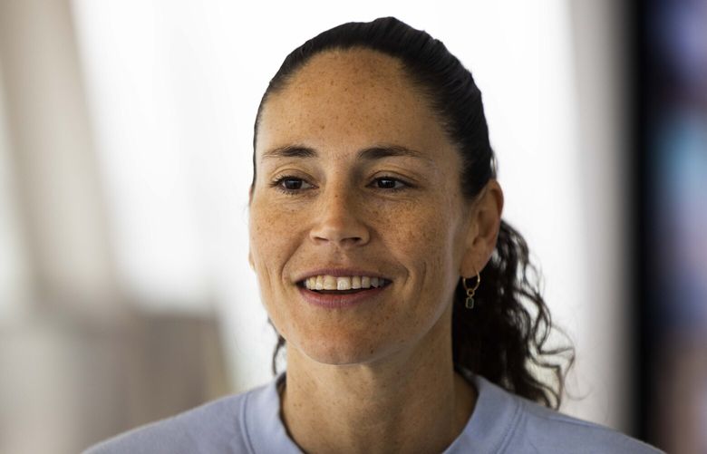 Sue Bird addresses members of the media after raising a replica of her jersey retirement banner on top of the Space Needle in Seattle, Wash. on Friday, June 9, 2023.