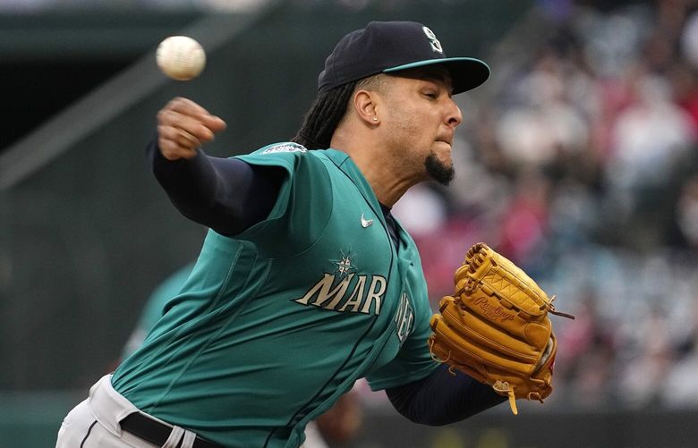 Seattle Mariners starting pitcher Luis Castillo throws to the plate during the first inning of a baseball game against the Los Angeles Angels Friday, June 9, 2023, in Anaheim, Calif. (AP Photo/Mark J. Terrill)