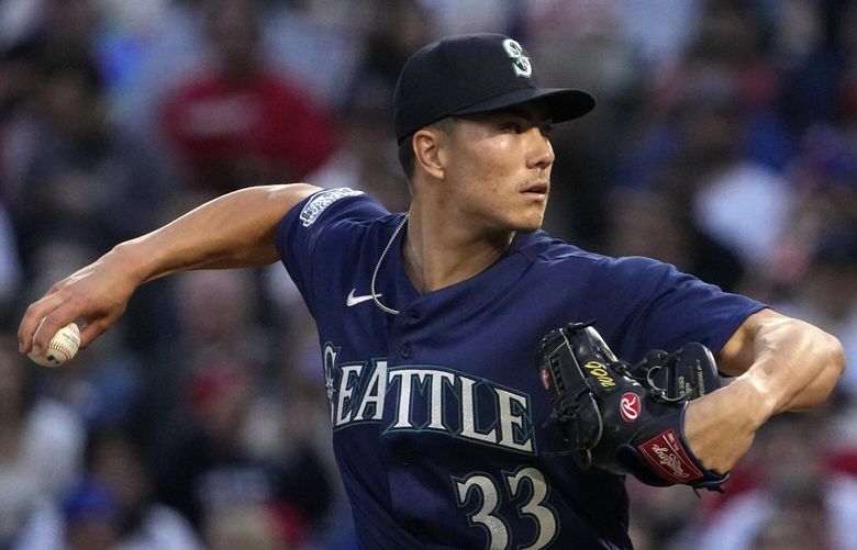 Seattle Mariners starting pitcher Bryan Woo throws to the plate during the first inning of a baseball game against the Los Angeles Angels Saturday, June 10, 2023, in Anaheim, Calif. (AP Photo/Mark J. Terrill) ANS101 ANS101