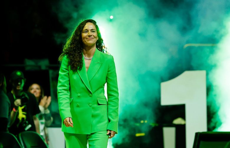 Former Storm player Sue Bird walks onto the court before the start of her jersey retirement ceremony.  224111