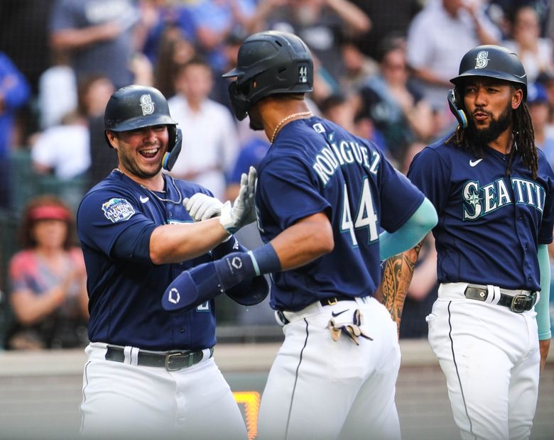 Seattle Mariners' Ty France looks down after striking out to end