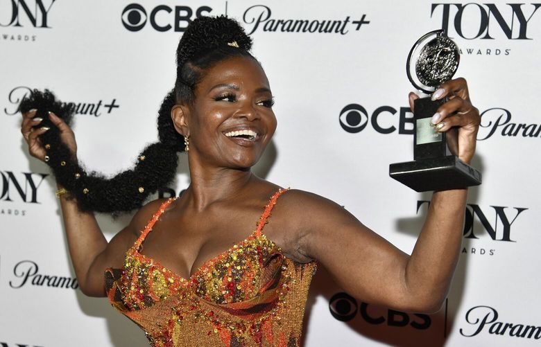 LaChanze, winner of the awards for best musical for “Kimberly Akimbo” and best revival of a play for “Topdog/Underdog,” poses with one of her awards in the press room at the 76th annual Tony Awards on Sunday, June 11, 2023, at the Radio Hotel in New York. (Photo by Evan Agostini/Invision/AP) NYRA995 NYRA995