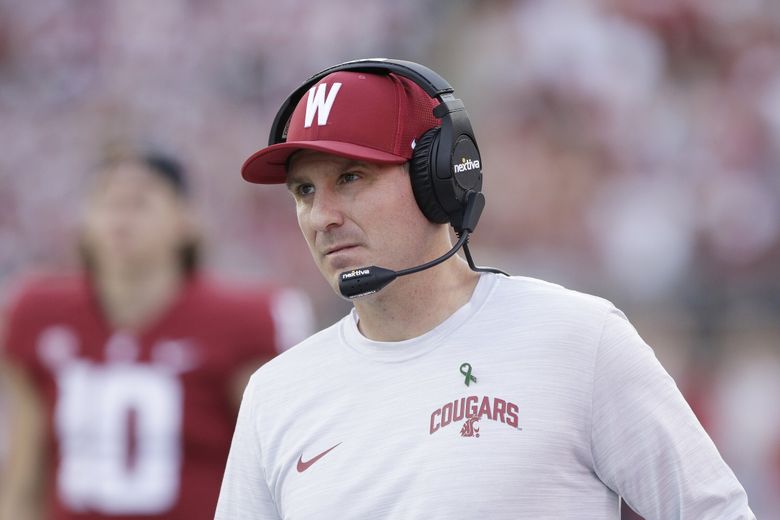 FILE – Washington State head coach Jake Dickert walks along the sideline during the second half of an NCAA college football game against California, on Oct. 1, 2022, in Pullman, Wash. Dickert has agreed to a contract extension that will keep him tied to the Cougars through the 2027 season. (Young Kwak / AP)