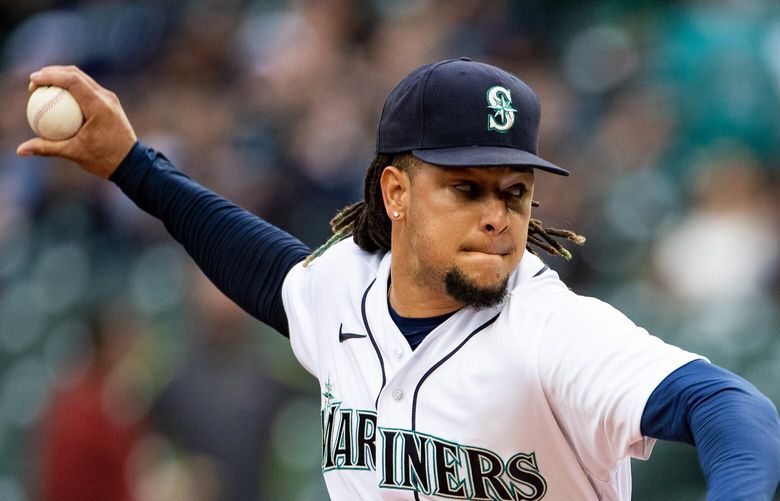 Mariners starting pitcher Luis Castillo, 58, throws in the first inning Wednesday, June 14, 2023, as the Seattle Mariners take on the Miami Marlins at T-Mobile Park in Seattle.