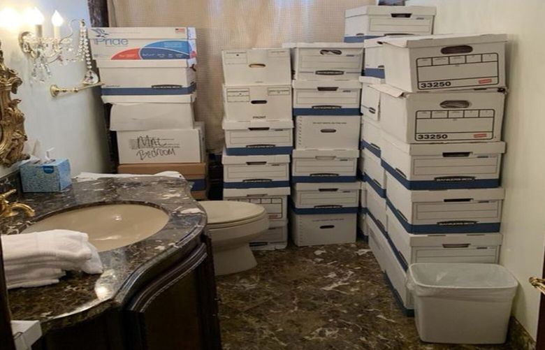 A photo provided by the Justice Department, and included in the unsealed indictment of former President Donald Trump, shows document boxes in a bathroom and shower in the Lake Room at Mar-a-Lago, Trump’s residence and private club in Palm Beach, Fla. The indictment reveals a shocking example of Trump’s indifferent attitude toward some of the country’s most sensitive secrets.   (Department of Justice via The New York Times) – NO SALES; EDITORIAL USE ONLY- XNYT0883 XNYT0883