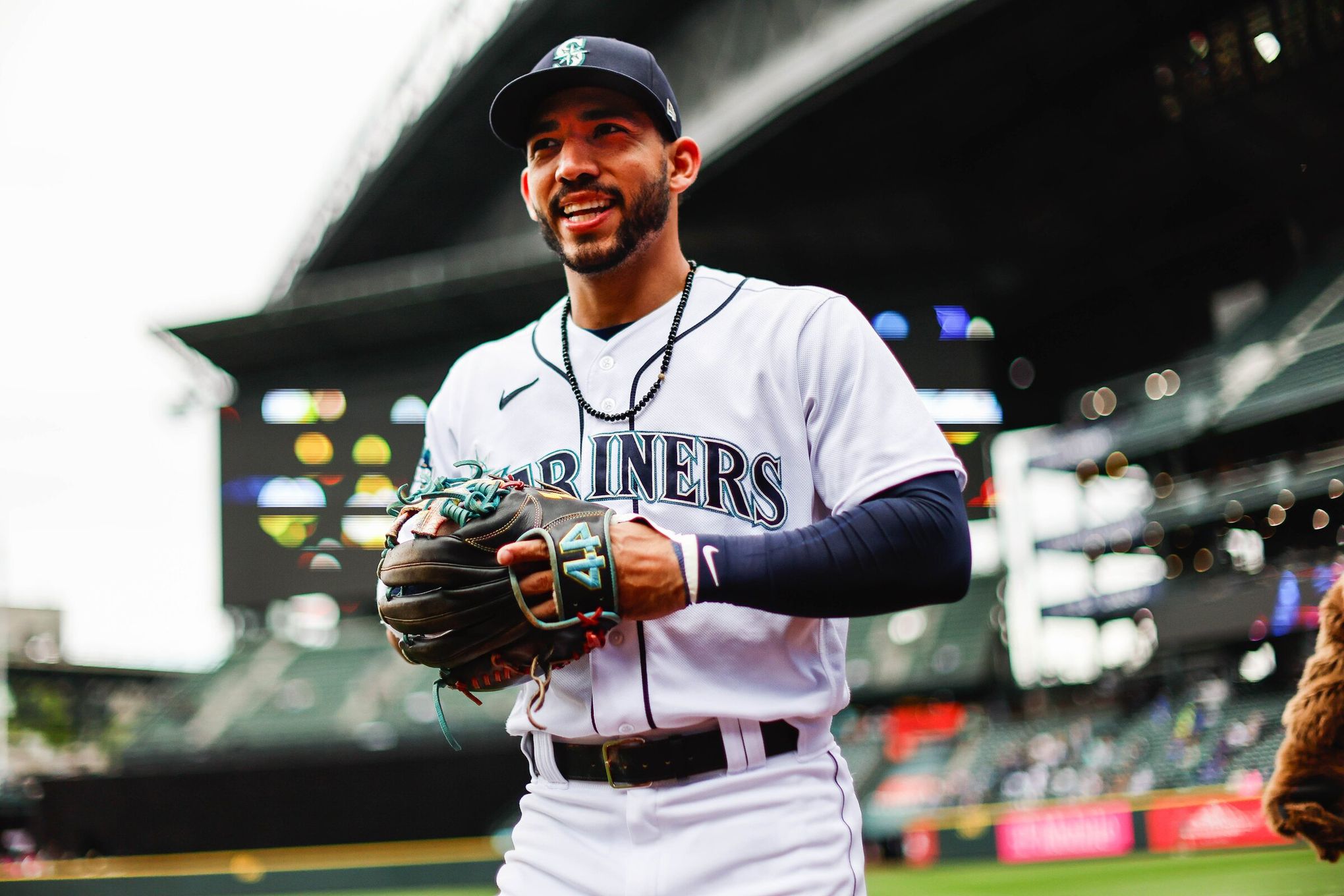 Seattle Mariners' Jose Caballero (76) and Julio Rodriguez (44