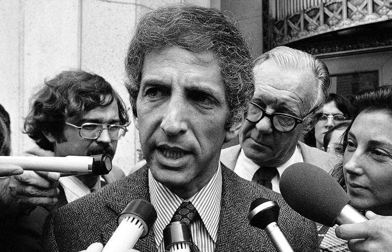 FILE – Daniel Ellsberg, co-defendant in the Pentagon Papers case, talks to media outside the Federal Building in Los Angeles, April 28, 1973.   Ellsberg, the government analyst and whistleblower who leaked the “Pentagon Papers” in 1971, has died.  He was 92. (AP Photo/Wally Fong, File) WX101 WX101