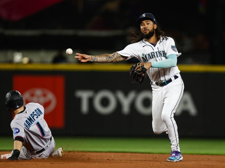 J.P. Crawford of the Seattle Mariners runs to first base during